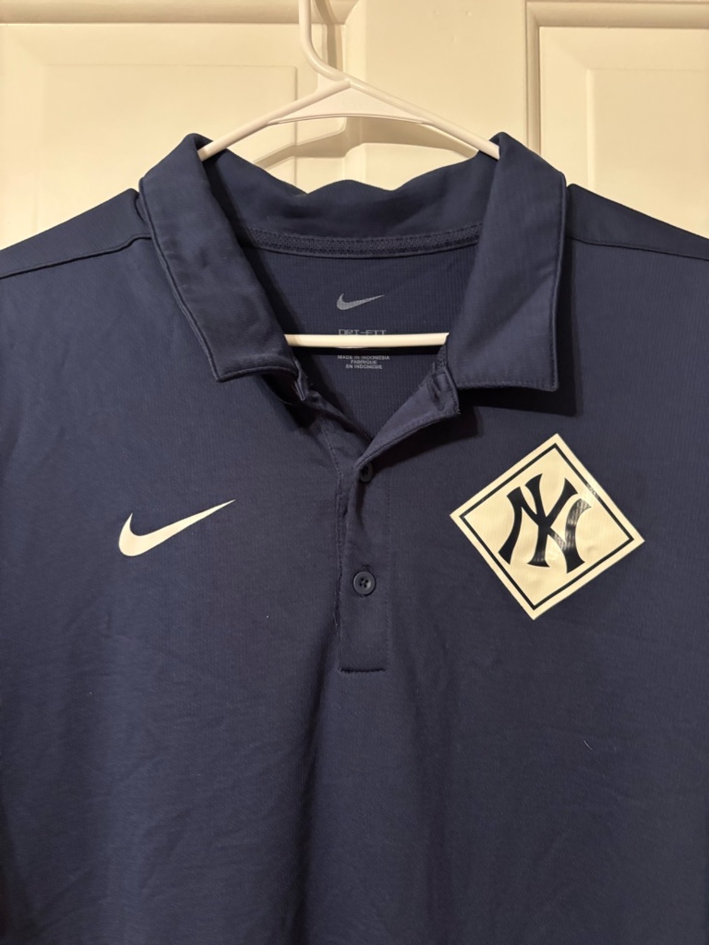 Nike Navy Polo with White Logos